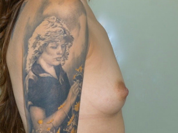 before breast augmentation right side view of female patient 2259
